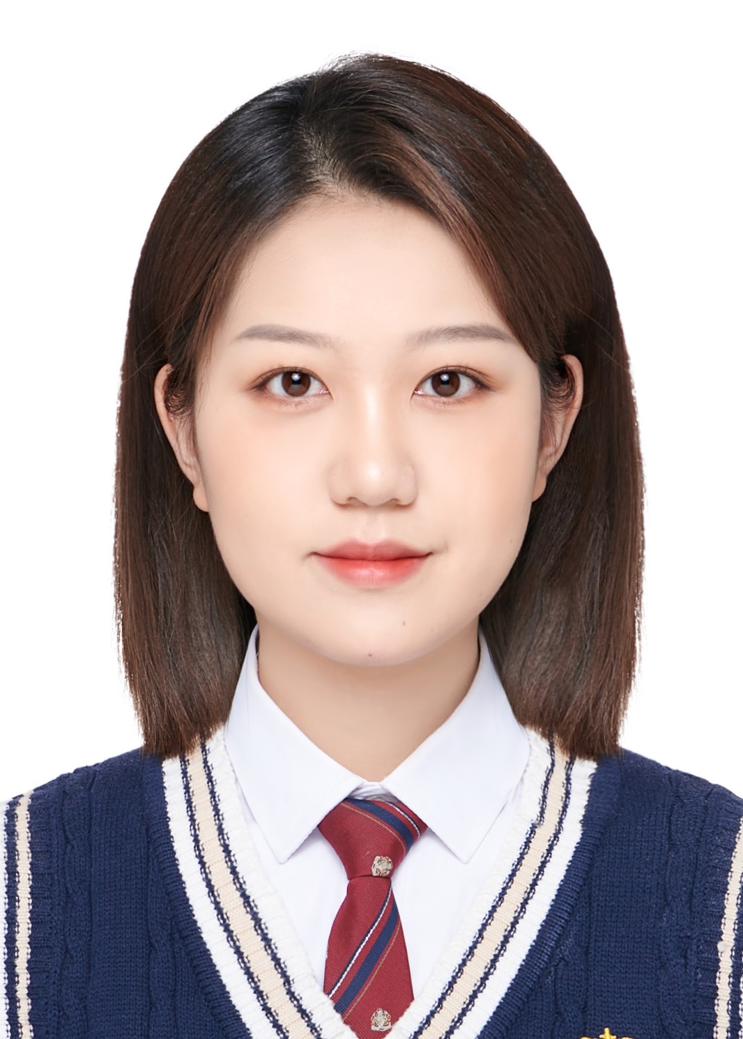 A person in a school uniform Description automatically generated